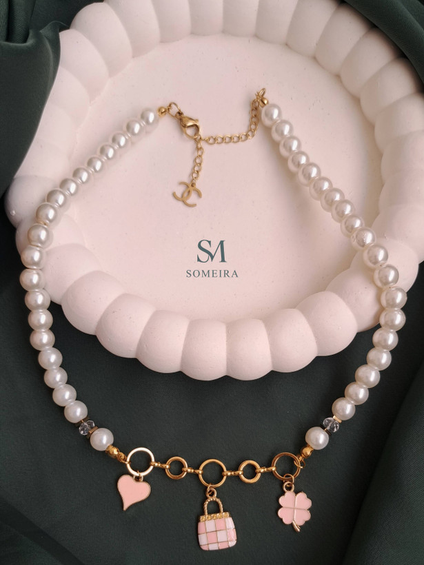 گردنبند مرواریدی چارم صورتی