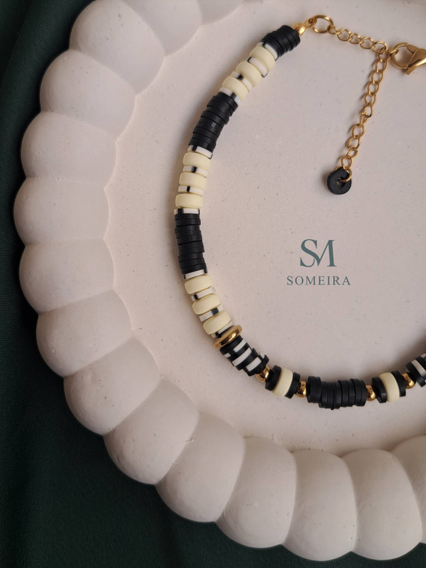 پابند زرد و مشکی